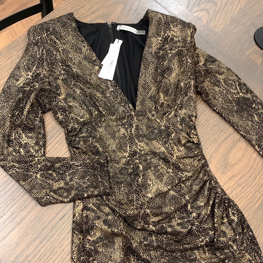 Alice + Olivia dress. Size 8 fits like a small brand new tags attached